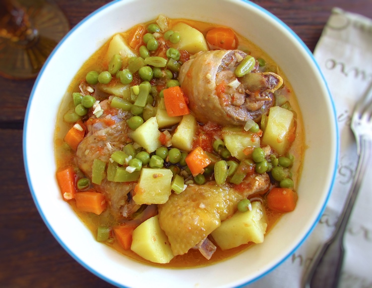 Hearty chicken stew on a dish bowl