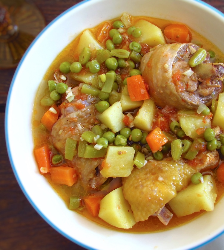 Hearty chicken stew on a dish bowl